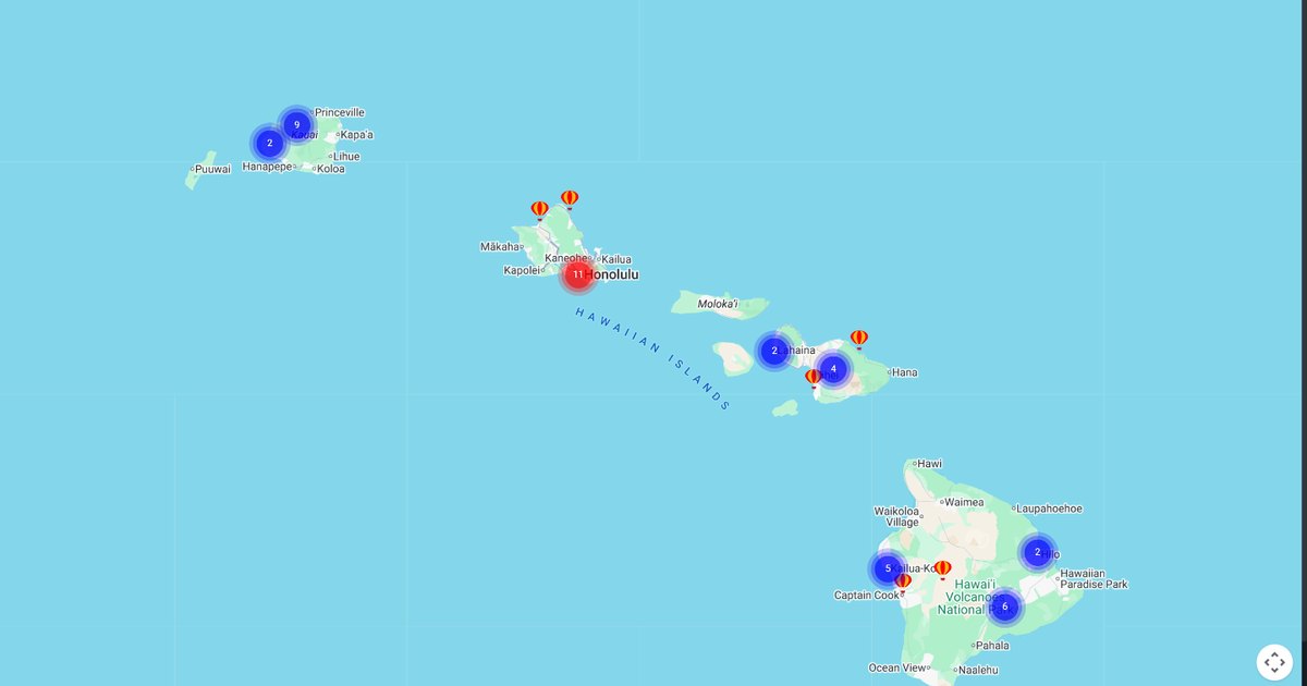 The Hawaiian islands on TraVidMap with clustered video markers: nine and two on Kaua'i, eleven at Honolulu, two and four on Maui, and five, six and two across the Big Island.
